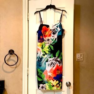 flowered dress stretches very comfortable semi used.
